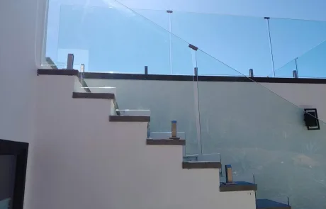 Glass and railing and fencing.