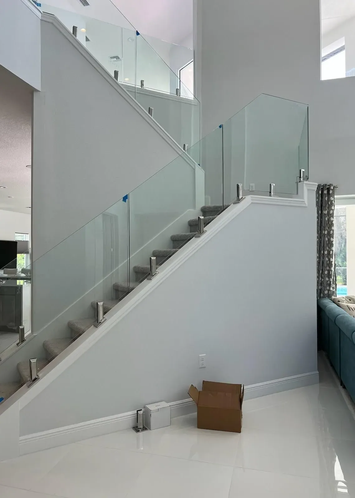 Frameless glass railing system installed by Clearview Safety Glass.